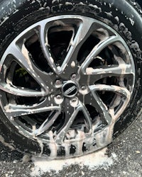 an image of a car tire with soap on it